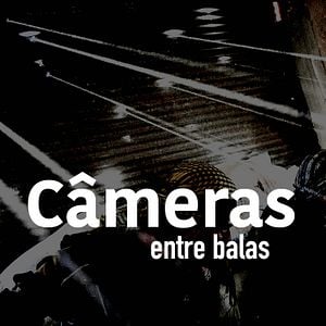 Foto Câmera Entre Balas