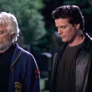 Foto Homens com Vassouras