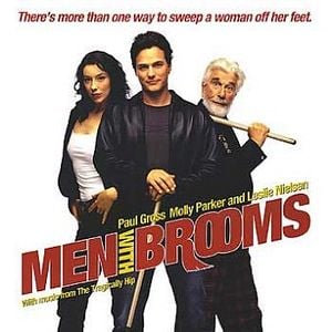 Foto Homens com Vassouras