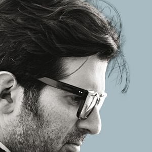 Foto O Homem ao Lado