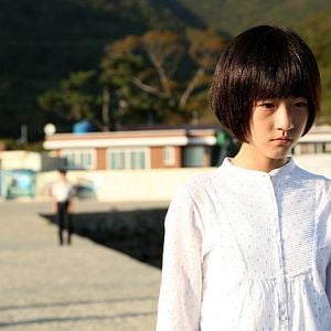 Foto Uma Garota à Porta