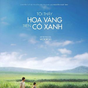 Foto Yellow Flowers on the Green Grass