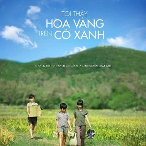 Foto Yellow Flowers on the Green Grass