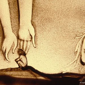 Foto Menina de Areia