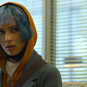 Foto KIMI - Alguém Está Escutando