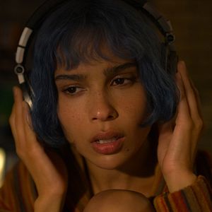 Foto KIMI - Alguém Está Escutando