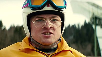 Imagem da notícia Hugh Jackman ensina Taron Egerton a saltar no trailer legendado de Voando Alto